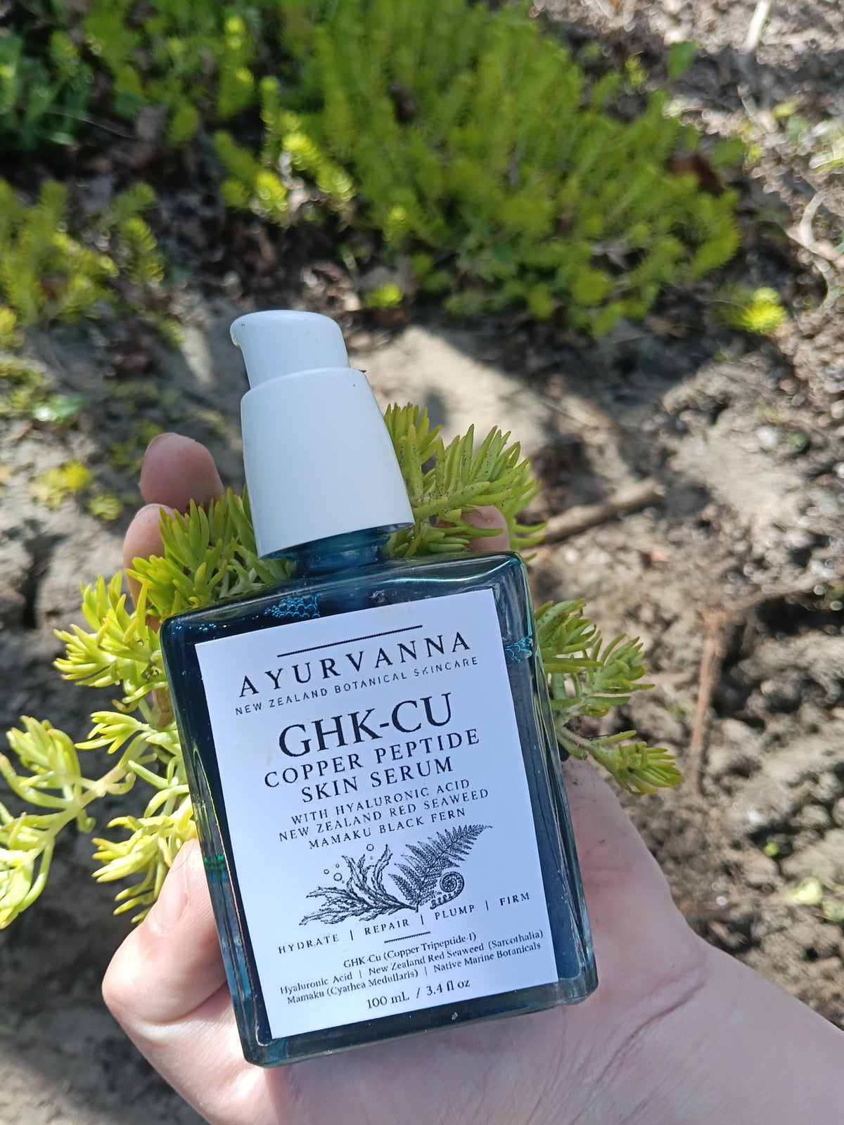Ayurvanna GHK-Cu serum among green plants